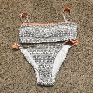 black, white, and coral bikini